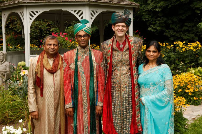 It takes a family to make a wedding memorable. From L to R: Vijay, Rishi, Dan and Sushma at the same-sex Hindu wedding of their son, Rishi with Dan. Supplied photo.