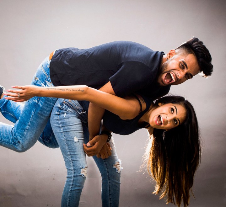 YouTwoTV's Jaz and Harjit pose in a goofy shot.
