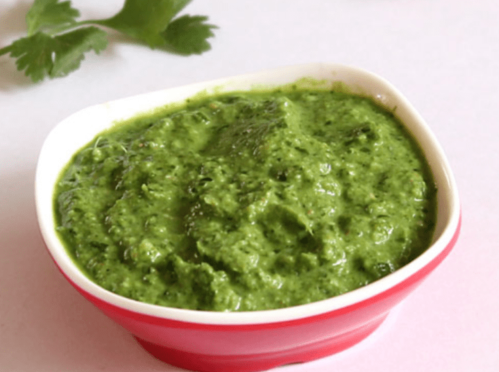 A bowl of green chutney
