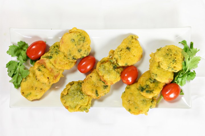 A photo of skewer of kababs.